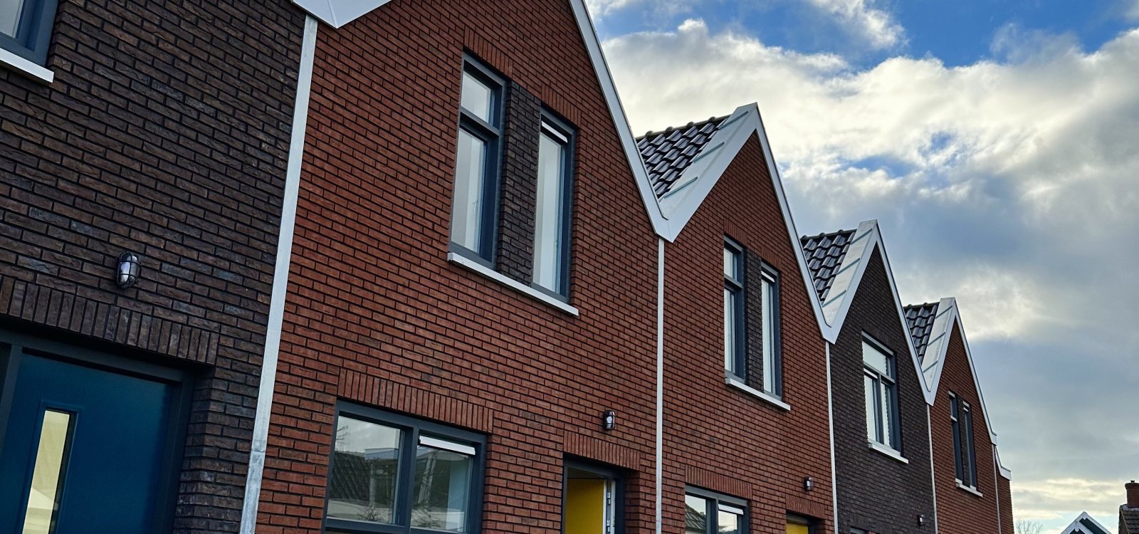 Zij aanzicht nieuwe woningen Departementstraat